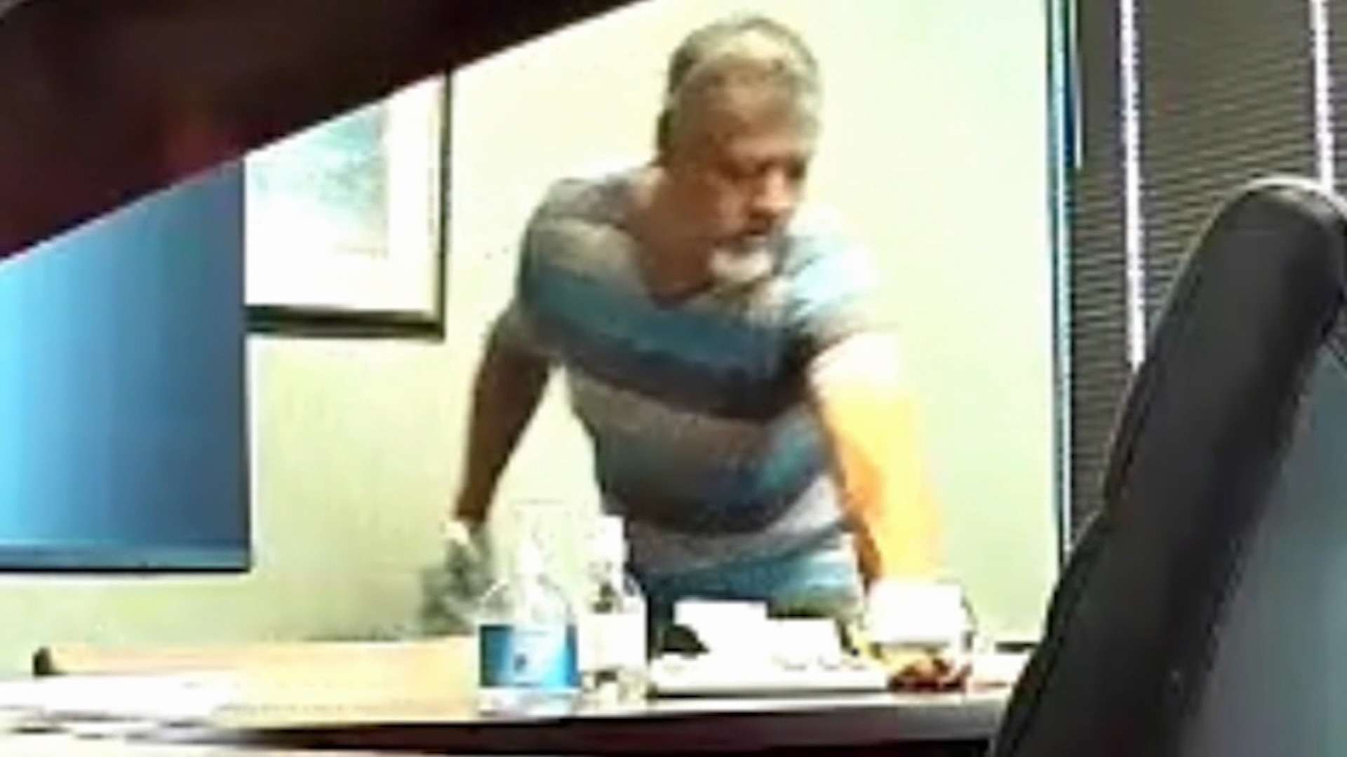 A secret camera allegedly caught the janitor in the act