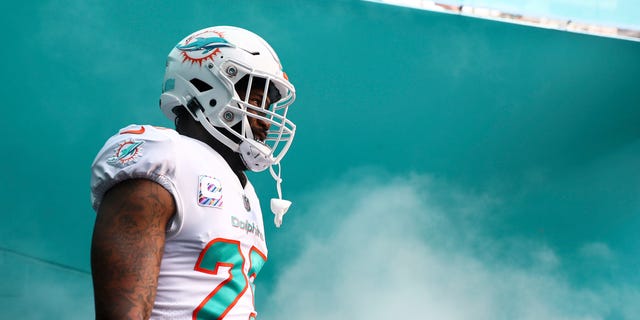 Xavien Howard #25 of the Miami Dolphins walks through the tunnel prior to an NFL football game against the Minnesota Vikings at Hard Rock Stadium on Oct. 16, 2022 in Miami Gardens, Fla.