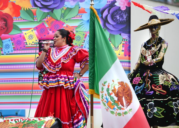 Araceli Figueroa from Los Banos sings during the Cinco de Mayo celebration in downtown Vallejo on Saturday. (Chris Riley/Times-Herald)